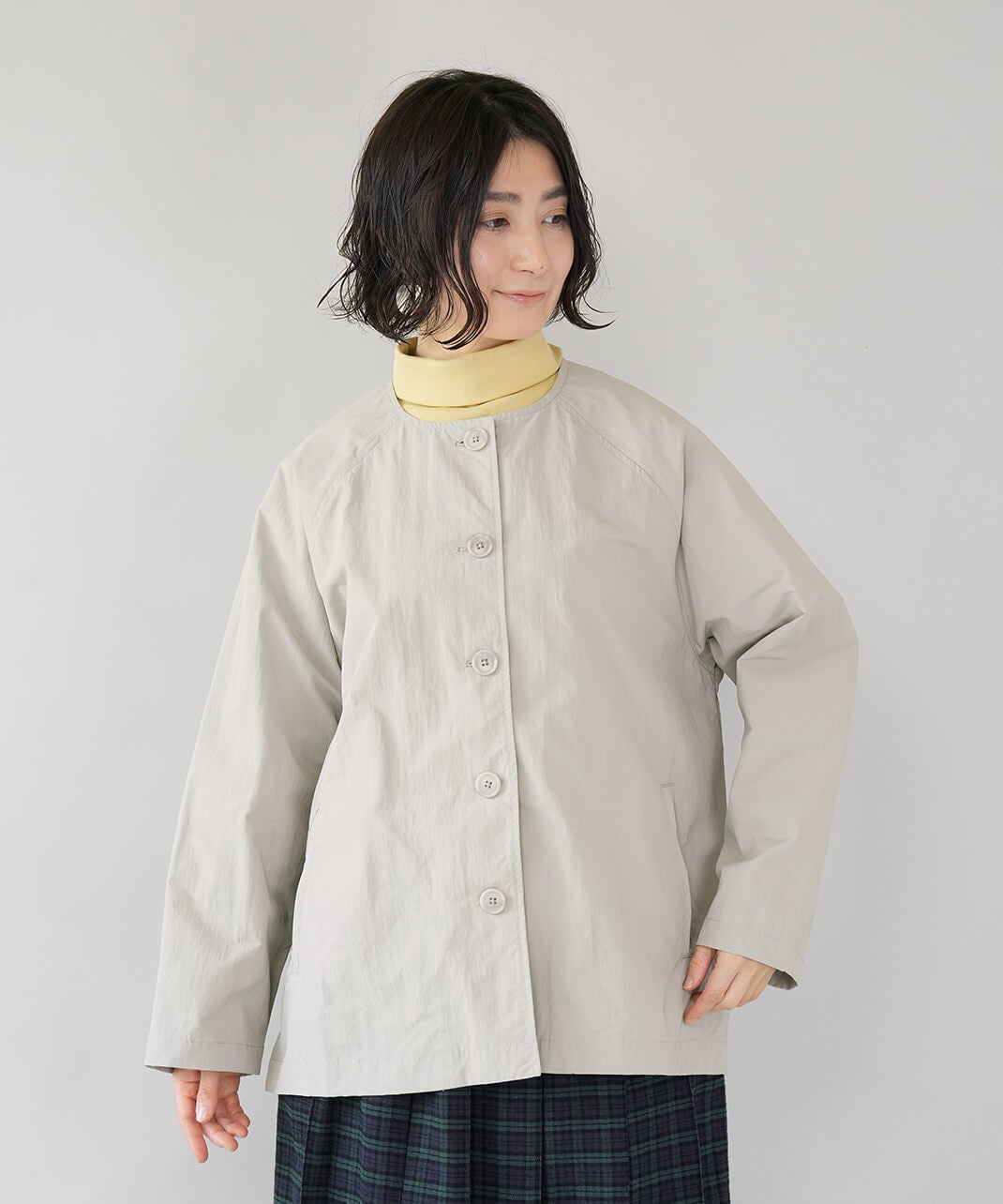 mumokuteki撥水加工ナイロンのノーカラージャケット | mumokuteki