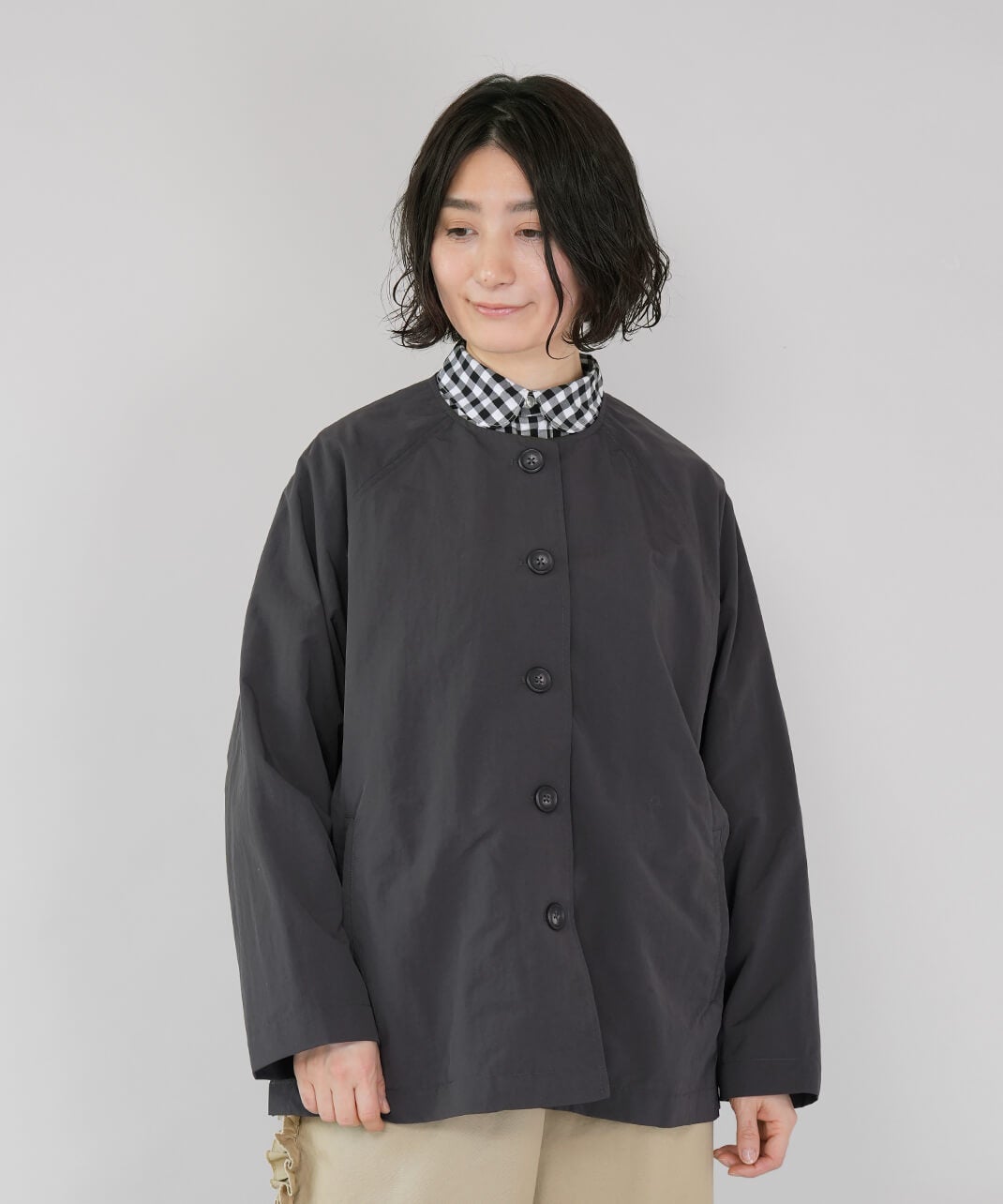 mumokuteki撥水加工ナイロンのノーカラージャケット | mumokuteki