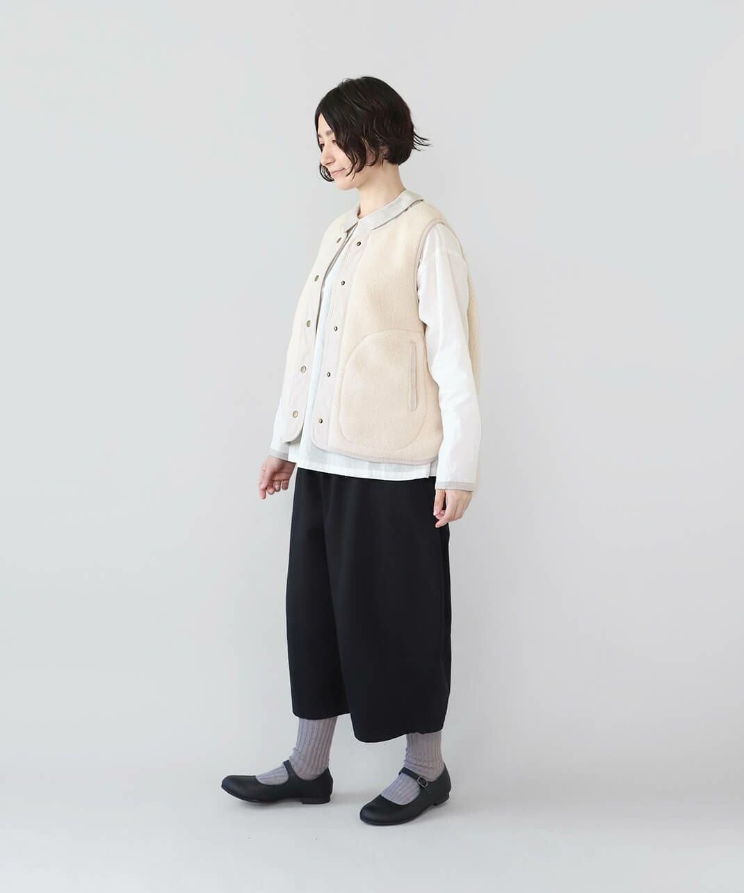 mumokutekiボアフリースのスナップボタンベスト | mumokuteki