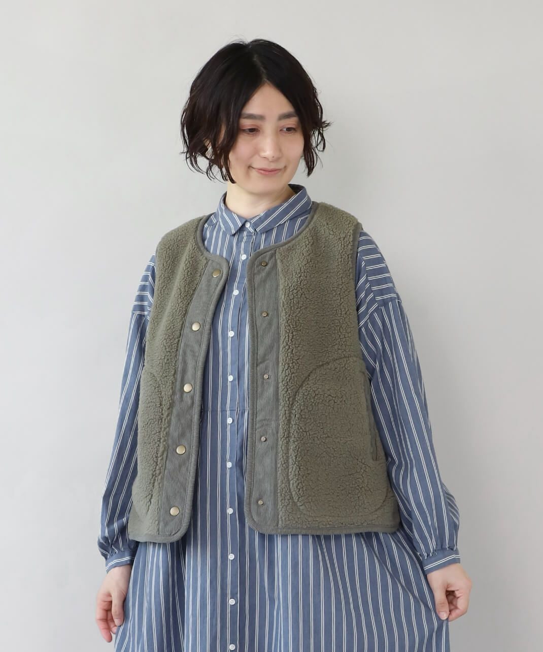 mumokutekiボアフリースのスナップボタンベスト | mumokuteki