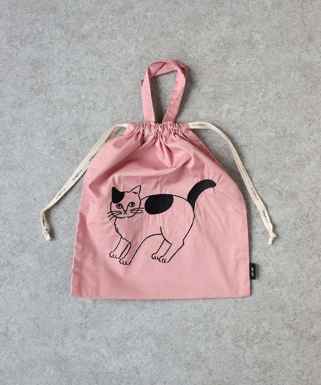 松尾ミユキEmbroidered Drawstring bag L | mumokutekiオンラインストア