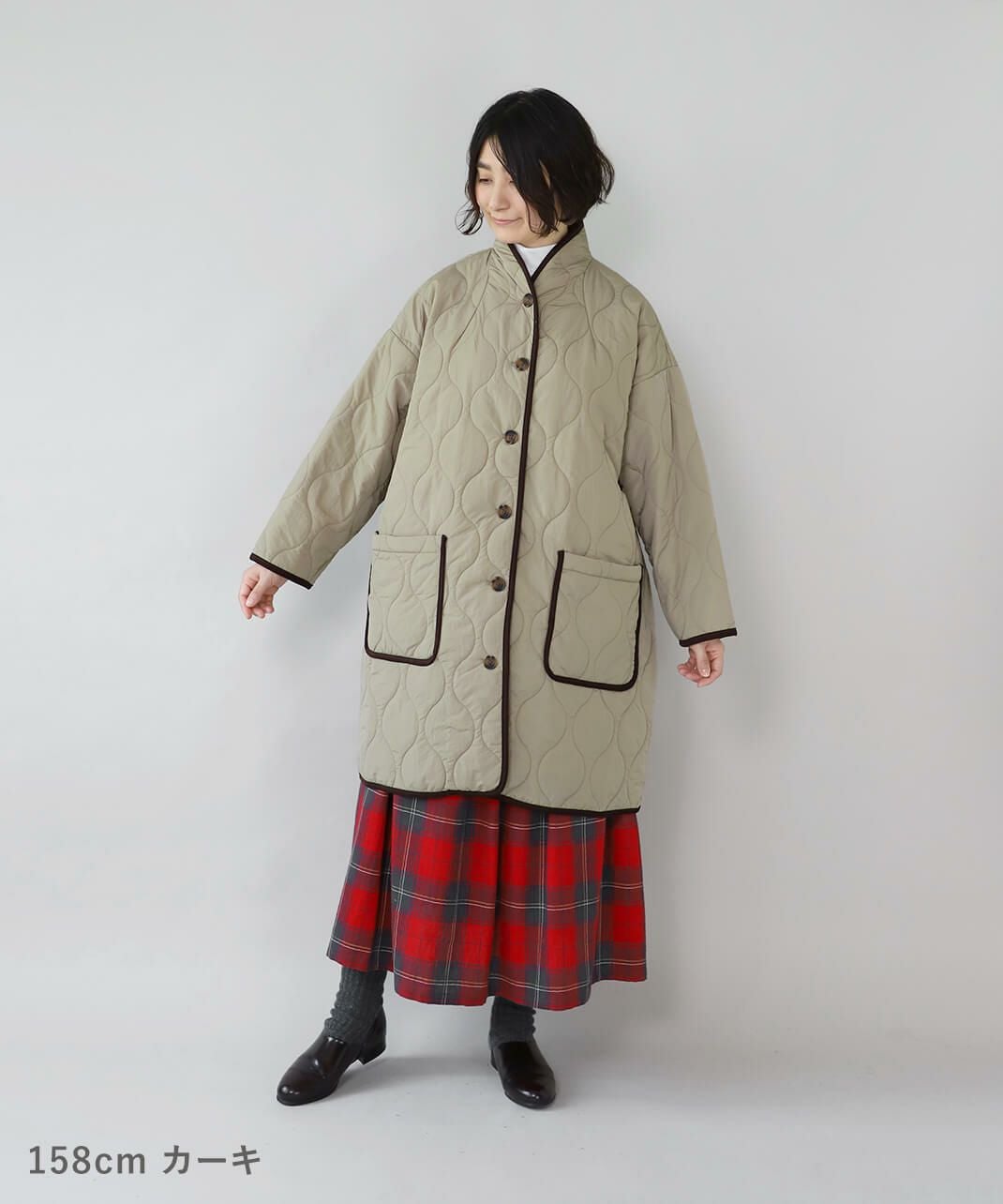 YURK geniet vanショールカラーのパイピングキルティングコート