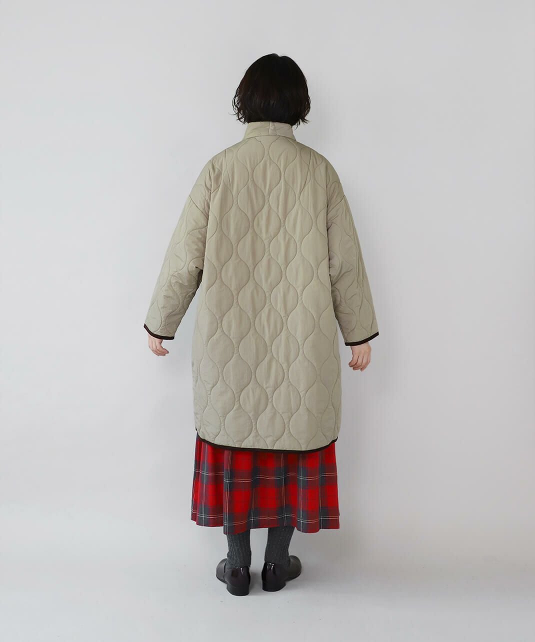 YURK geniet vanショールカラーのパイピングキルティングコート