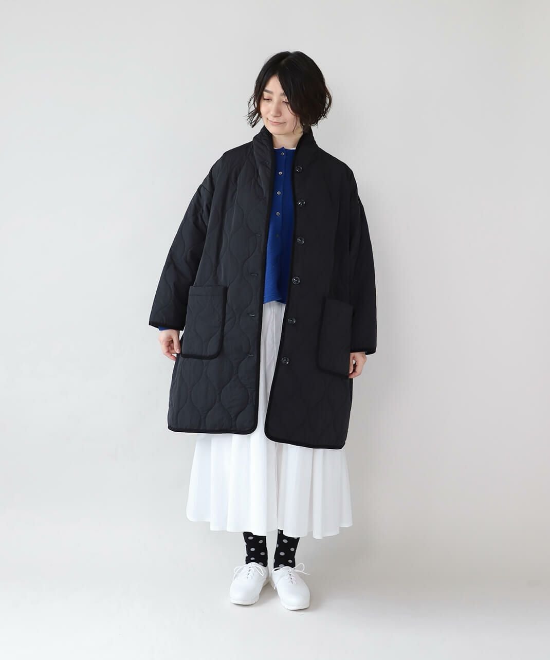 YURK geniet vanショールカラーのパイピングキルティングコート